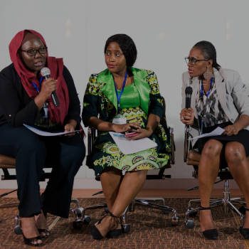 A Group of Business Women Participating in a Panel Discussion